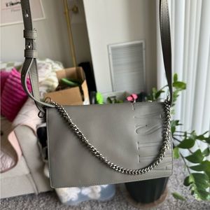 All Saints clutch cross body. Like new barely ever worn.